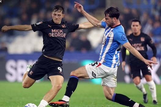 Harry Leonard scores for Posh at Huddersfield Town. Photo Joe Dent/theposh.com.