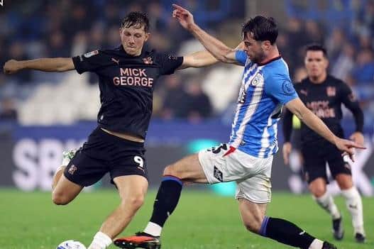 Harry Leonard scores for Posh at Huddersfield Town. Photo Joe Dent/theposh.com.