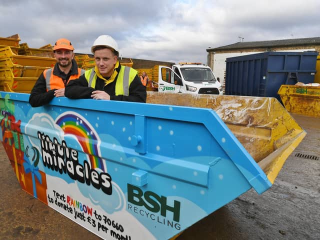 Chris Seggie, MD of BSH skips, Fengate  with artist Nathan Murdoch and the charity skips he has painted