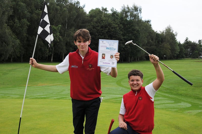 Leo Brown and Sam Marshall, from Elton Furze Golf Club, are pictured doing the Longest Day Challenge of 101 holes in aid of a cancer charity.