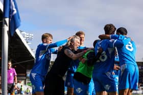 Posh boss Robbie Savage joins in the celebrations after Matt Garbett's last-gasp equaliser against Burton Albion. Photo Joe Dent/theposh.com