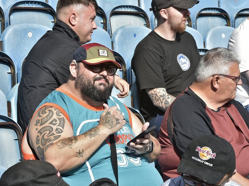 Peterborough United fans watch the draw with Leyton Orient.
