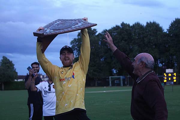 Peterborough Town skipper Kyle Medcalf with the Stamford T20 Shield. Photo: Jason Richardson