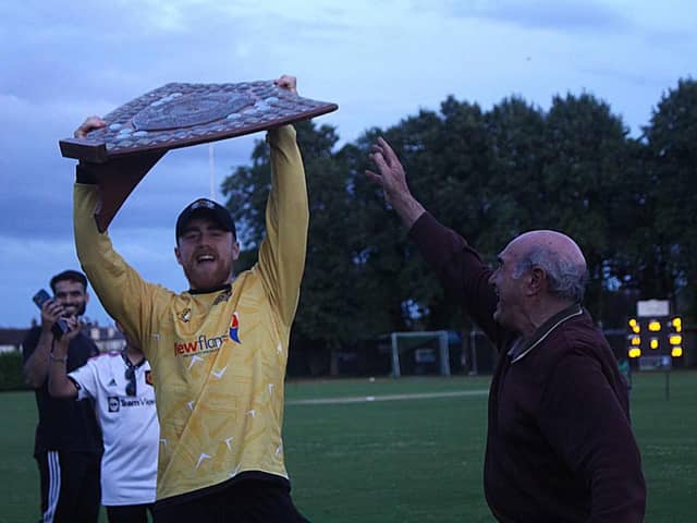Peterborough Town skipper Kyle Medcalf with the Stamford T20 Shield. Photo: Jason Richardson