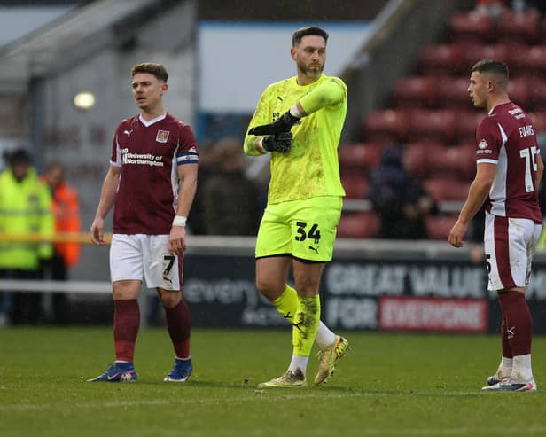 Unhappy Cobblers players, Sam Hoskins,  Ross Fitzsimmons and Jake Evans during the recent home defeat at the hands of Leyton Orient. Photo Pete Norton Getty Images.