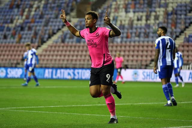 Jonson Clarke-Harris celebrates his goal at Wigan in October, 2020. (Photo by Lewis Storey/Getty Images).
