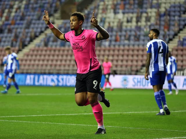 Jonson Clarke-Harris celebrates his goal at Wigan in October, 2020. (Photo by Lewis Storey/Getty Images).