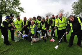 Litter pickers at work in Millfield, Peterborough during a 2012 Love Where You Live campaign.