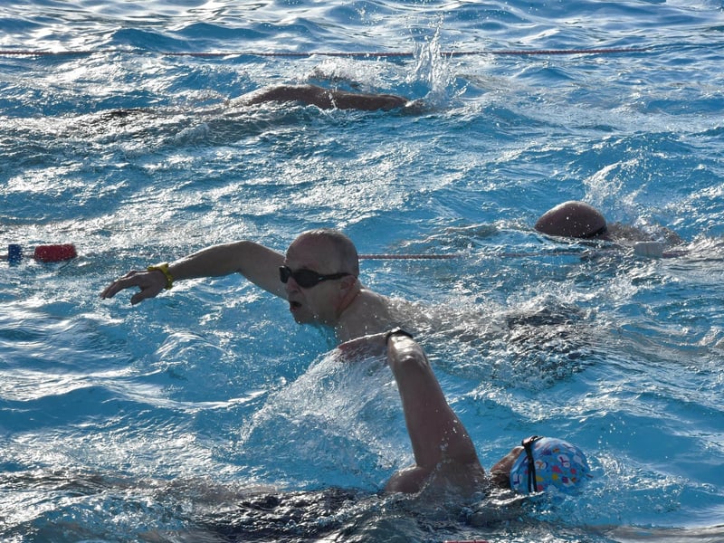 Swimmers enjoy some morning sun.