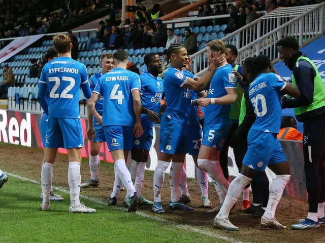 Peterborough United players celebrate the winning goal against Shrewsbury. Photo: Joe Dent/theposh.com.
