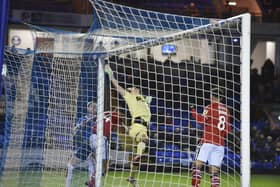 Charlton goalkeeper Ashley Maynard-Brewer clawed this Posh corner to safety. Photo: David Lowndes.