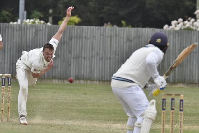 Jamie Smith bowling for Peterborough Town 2nds during a 16-run Northants Division One defeat at the hands of Burton Latimer. Photo: David Lowndes.