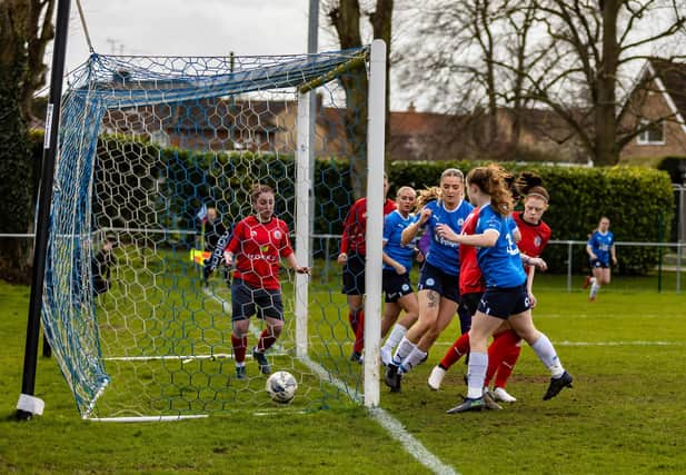 Posh open the scoring against Wem Town. Photo: Ruby Red Photography.