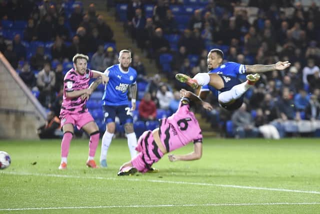 Jonson Clarke-Harris converts Posh's second of the game. Photo: David Lowndes.