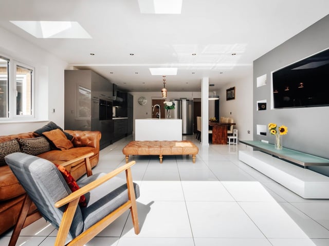 Another view of the kitchen/dining area from the adjoining family room