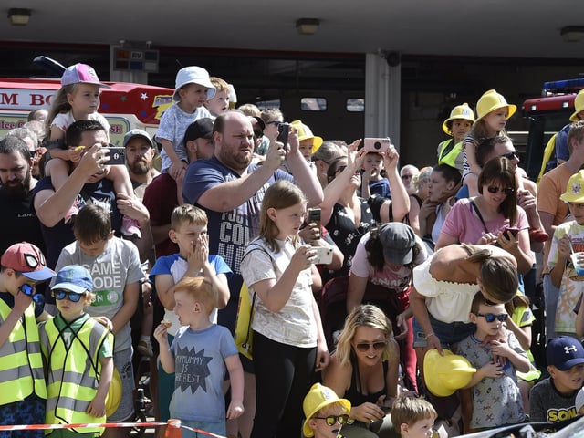 Crowds enjoy the demonstration.