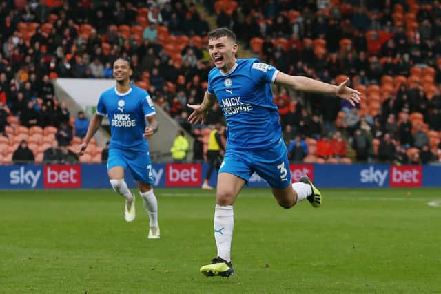 Harrison Burrows celebrated putting Peterborough United 2-0 up. Photo: Joe Dent.