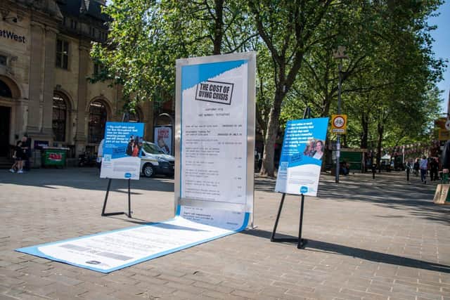 Displayed at Cathedral Arch in Peterborough, the stark 16-ft-long receipt, which overspills its frame and trails along the ground, reveals just how much Sue Ryder’s palliative care and bereavement services cost to run. This coincides with new data showing the cost of Sue Ryder care has increased by 20% and people needing vital end-of-life care is due to increase by 55% by 2030. Photograph commissioned by Sue Ryder and taken by Beth Crockatt. 