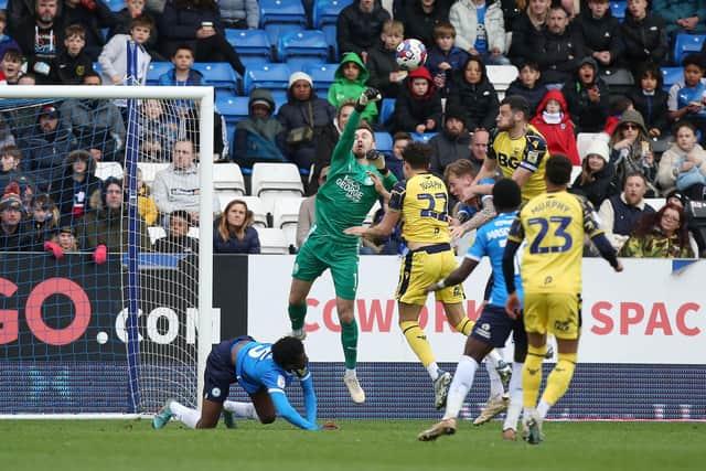 Will Norris of Peterborough United punches the ball clear in the game against Oxford. Photo: Joe Dent/theposh.com.