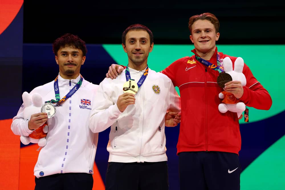 Jake Jarman (left) on the podium after the vault competition at the World Gymnastics Championships (Photo by Dean Mouhtaropoulos/Getty Images)