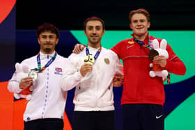 Jake Jarman (left) on the podium after the vault competition at the World Gymnastics Championships (Photo by Dean Mouhtaropoulos/Getty Images)
