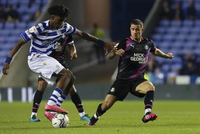 Oliver Norburn (right) in action for Posh. Photo: Joe Dent/theposh.com.