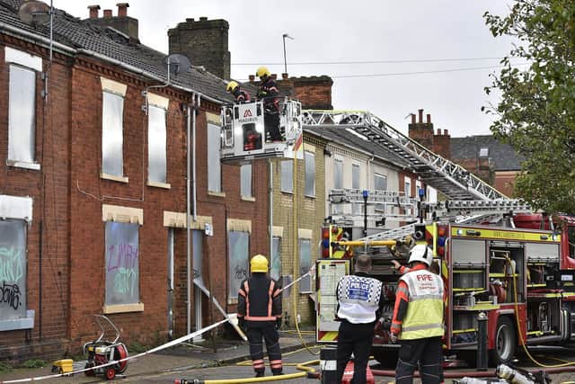 Fire at un-occupied houses at Cromwell Road.