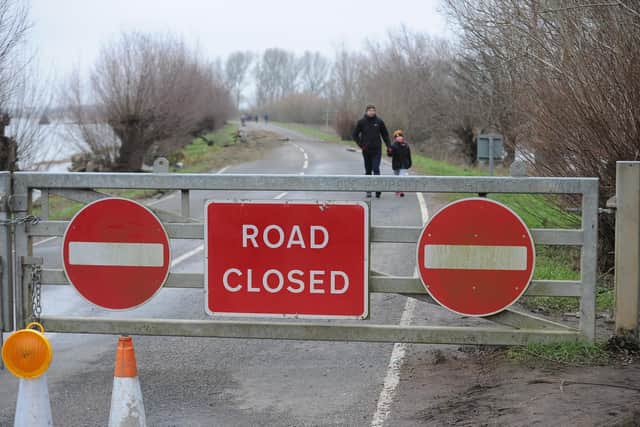 North Bank Road is closed as a flood warning has been issued
