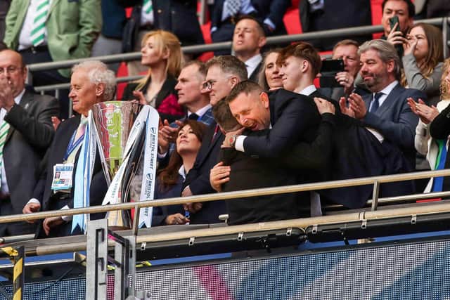 Darragh MacAnthony gives Darren Ferguson a warm welcome in the Royal Box after the win at Wembley. Photo Joe Dent/theposh.com.