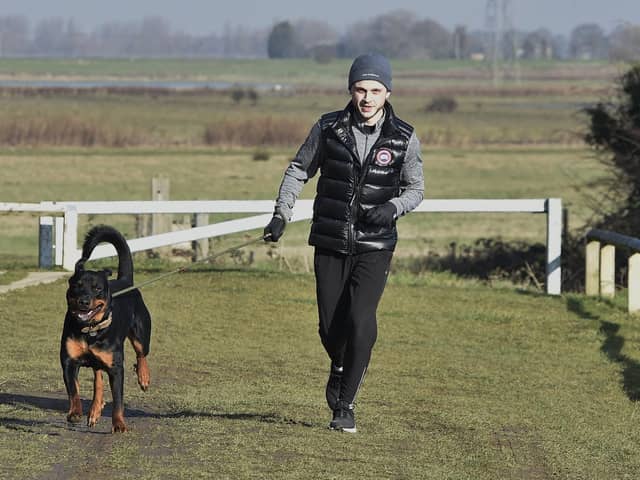 Joe Hambleton of Whittlesey training with his dog Hugo in preparation for a 60-mile charity running challenge next month