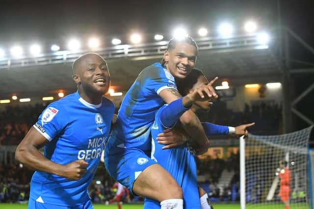 Jadel Katongo (centre) celebrates the first Football League goal of his career. Photo David Lowndes.