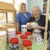 Jeanette measuring out sweets at Primrose Hill Care Home