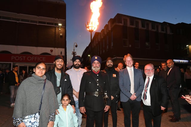 Deputy Lieutenant of Cambridgeshire Jaspal Singh (centre) with MP for Peterborough Paul Bristow and Council leader Wayne Fitzgerald.