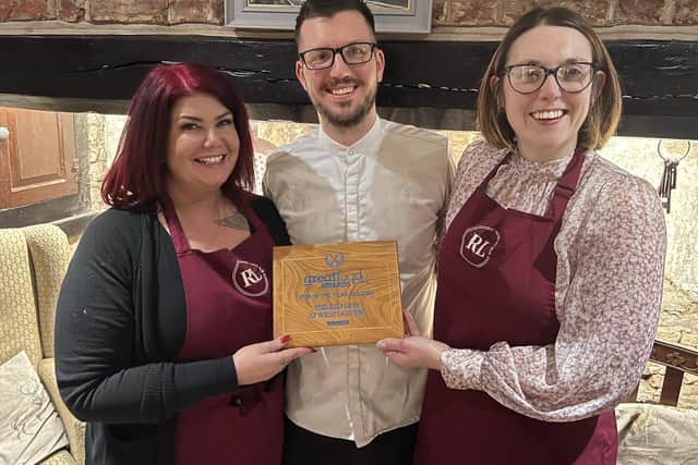 From left, Susie Kent (front of house supervisor) Frazer King (Chef Owner) with wife Emma King (Front of house manager) at The Red Lion, West Deeping  - winners of Great Food Club Pub of the Year 23/24.