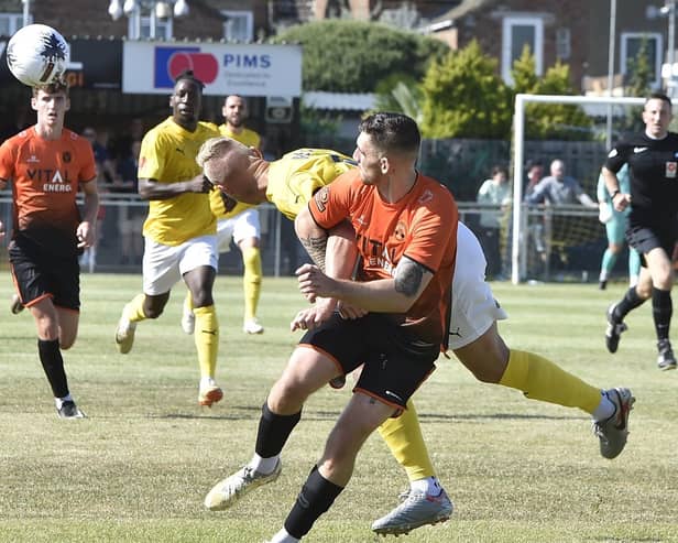 Action from Peterborough Sports v Brackley Town (yellow). Photo: David Lowndes,
