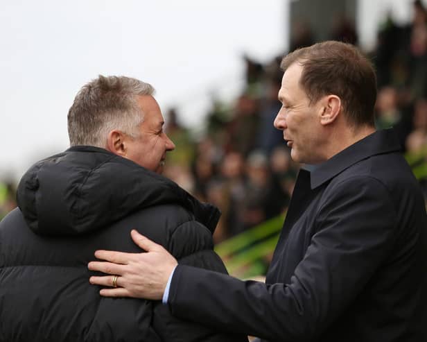 Peterborough United Manager Darren Ferguson (left) is greeted by Forest Green Rovers manager Duncan Ferguson before the game. Photo: Joe Dent/theposh.com.