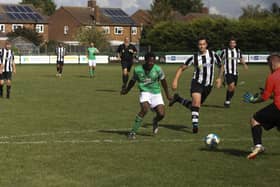 Bai Abi Njie scores one of his hat-trick goals for FC Peterborough Reserves v Long Sutton Athletic. Photo: Tim Symonds.