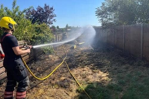 Cambridgeshire Fire and Rescue Service shared this photo of one of their crew members dealing with a bonfire that got out of control.