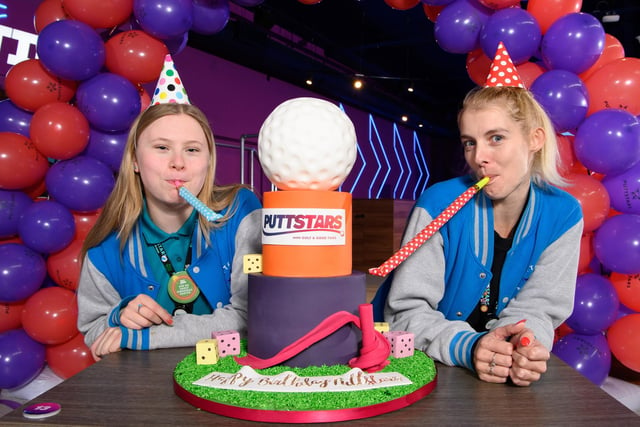 Staff at the Puttstars mini golf centre at the Queensgate Shopping Centre in Peterborough celebrate its first anniversary