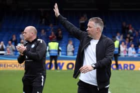 Darren Ferguson waves to the crowd after the final home league game of the season. Photo: Joe Dent.