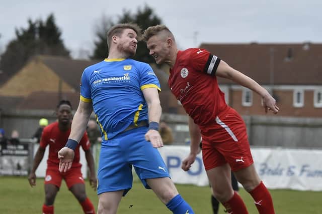 MIchael Gash (blue) in action for Peterborough Sports. Photo: David Lowndes.