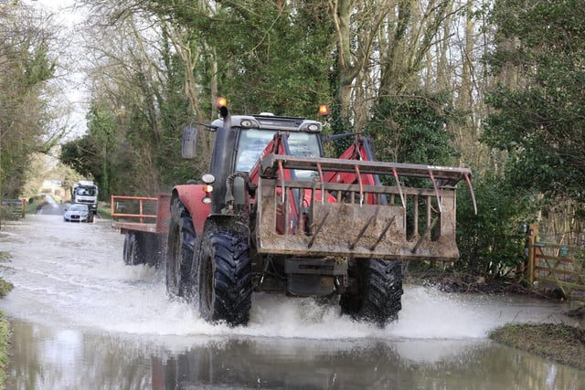Tractors could get through the water - Flooded roads have cut off villages near Oundle. Photo: Alison Bagley.