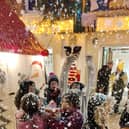 Kids enjoying snow machine