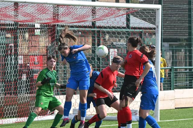 Action from Netherton United (red) v Whittlesey Athletic in the Women's FA Cup at the Grange. Photo David Lowndes.