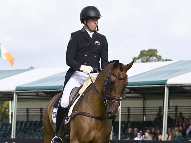 Reigning World Champion Tim Price (NZL) riding Global Quest