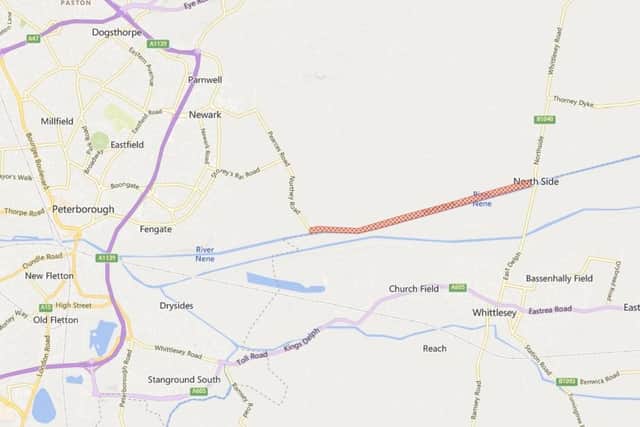 The red line area shows the section of the River Nene where the flood warning is in place.