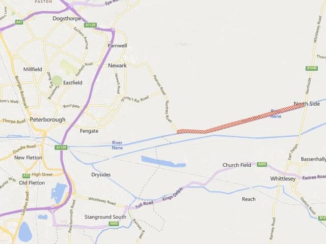 The red line area shows the section of the River Nene where the flood warning is in place.