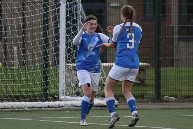 Attacking midfielder Jess Driscoll in action for Posh Women with team mate Niamh Connor.