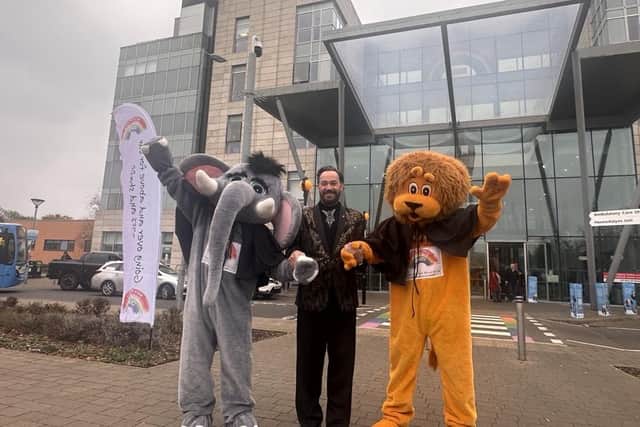 Charity patron Craig Revel Horwood with the hospital's mascots, who also took on the abseil.