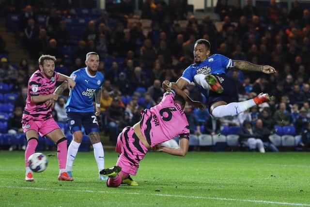 Jonson Clarke-Harris of Peterborough United scores the second goal against Forest Green Rovers. Photo: Joe Dent/theposh.com.